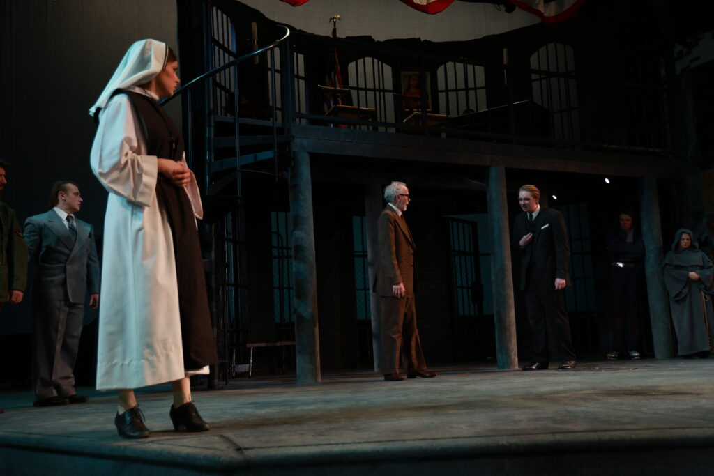 Emma Blonda as Isabel, with David Lee Painter as Escalus and Anthony Kirby as Angelo